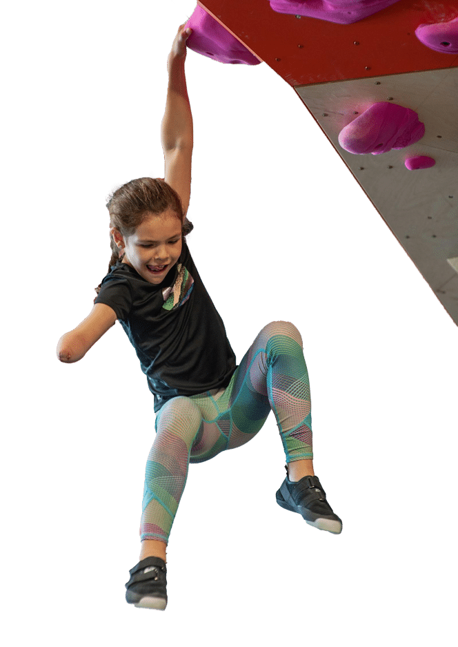 girl rock climbing one handed